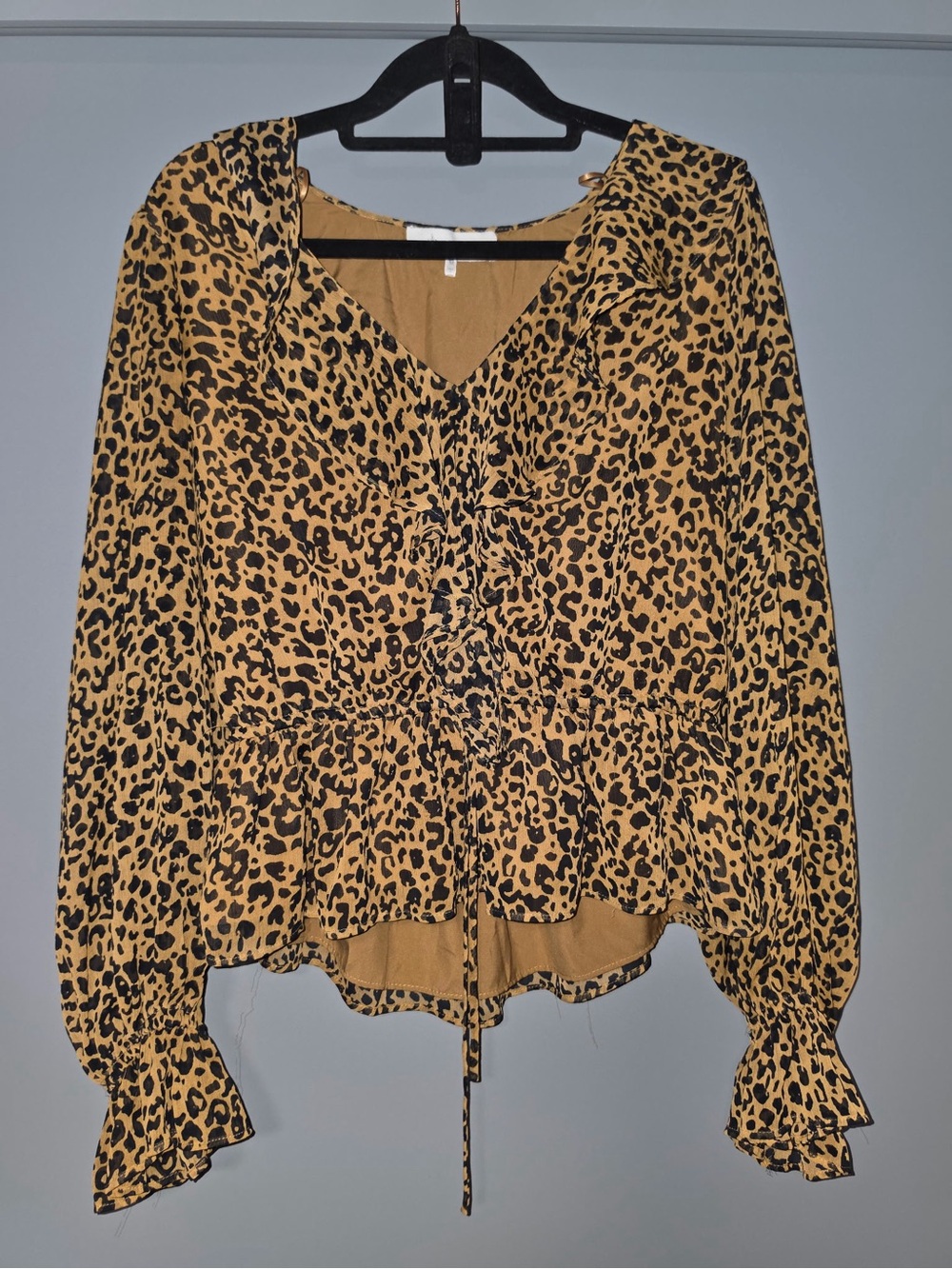 Leopard Print Ruffle Peplum Blouse -